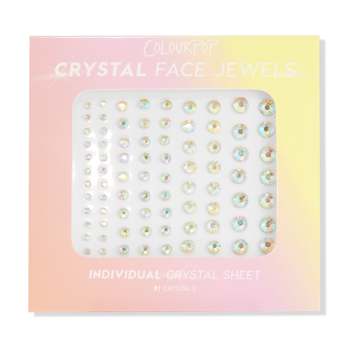 ColourPop Crystal Face Jewels Individual sheet displaying 81 iridescent round adhesive crystals in varied sizes arranged in neat rows, set in pastel pink-to-yellow ombré packaging for customizable face accents.
