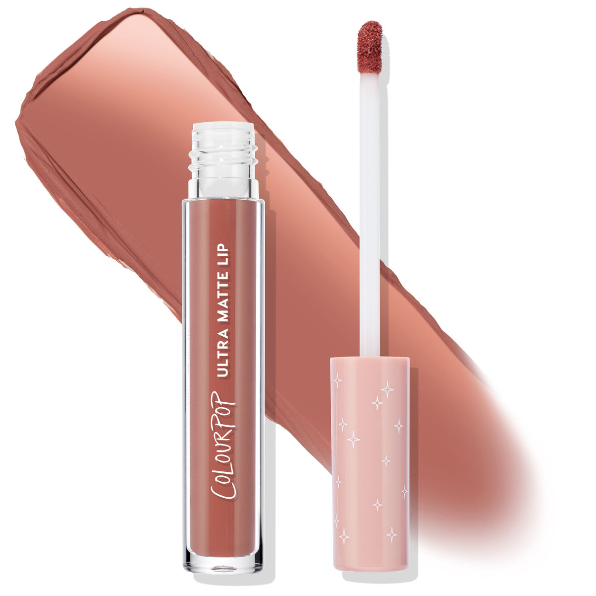 ColourPop Ultra Matte Lip Fifth Avenue liquid lipstick stands uncapped, doe-foot applicator beside a wide terracotta nude swatch, in a clear tube with white lettering and a blush cap printed with stars, showcasing a long-wear ultra matte finish.