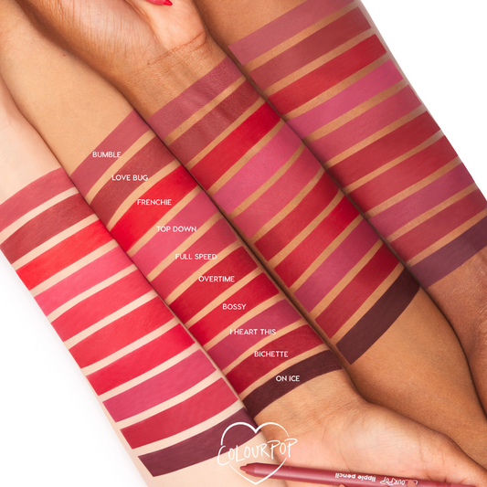 Bring The Heat Lippie Pencil swatched alongside other reds on three forearms, showing smooth matte payoff across skin tones; labeled shade bands stack up the arms with a ColourPop logo and pencil at the bottom.