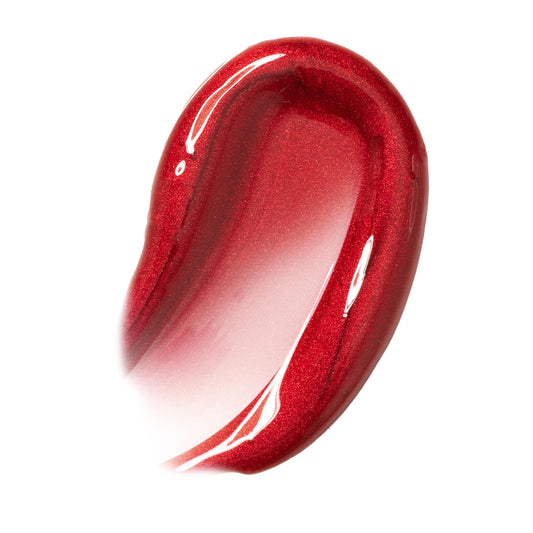 Ruby red swatch of ColourPop Ultra Glossy Lip in Runs with Vampires, gleaming with fine shimmer; a curved swipe shows sheer-to-opaque coverage and glassy shine on a white background.
