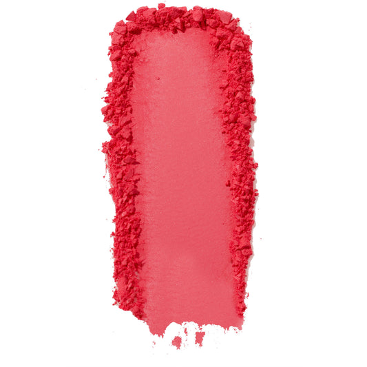 ColourPop Pressed Powder Blush Woo Me swatch - vibrant coral pink pigment swept in a thick vertical streak with a smooth center and crumbled edges, showing buildable payoff and texture on a clean white background.
