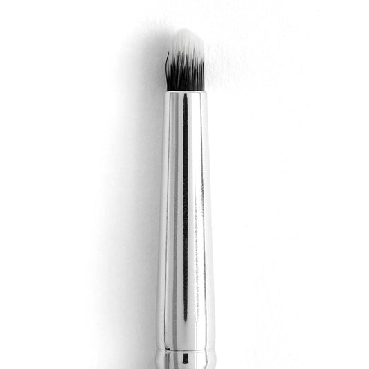 ColourPop Small Pencil Brush showcasing a tapered, dense black-to-white bristle tip for smudging eyeliner and precise eyeshadow detail, standing upright with a shiny silver handle against a clean white background.