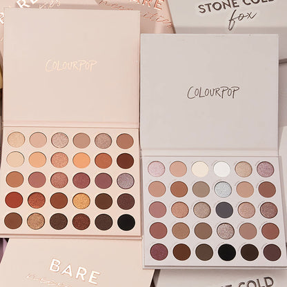 Bold + Bare ColourPop Shadow Palette Set displaying two open 30-pan palettes - warm neutrals and coppers on the left, cool taupes, mauves, and charcoals on the right - with matte and shimmer finishes, on a beige background with branded sleeves.