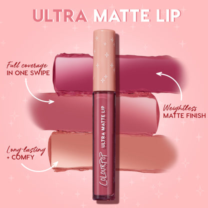 Tube of ColourPop Ultra Matte Lip in Tulum stands upright, showing a dusty rose‑mauve liquid lipstick with three matte swatches behind on a pink gradient background, highlighting full coverage in one swipe, weightless matte finish, and long‑lasting comfy wear.