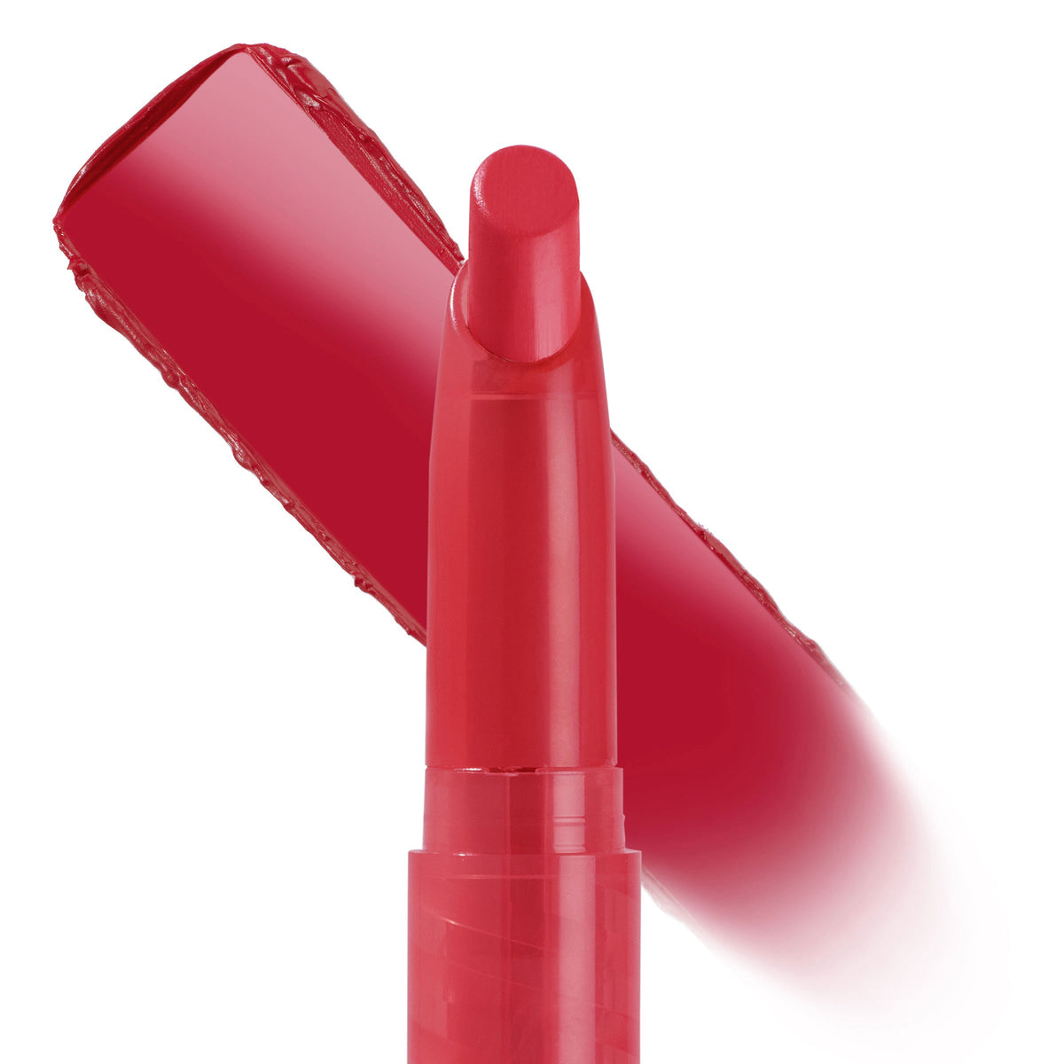 ColourPop Lippie Stix Hot in Here stands upright with the cap off, vivid warm red tip forward while a matching swipe of color streaks diagonally behind on a white background, showcasing the creamy, high‑pigment lipstick shade.