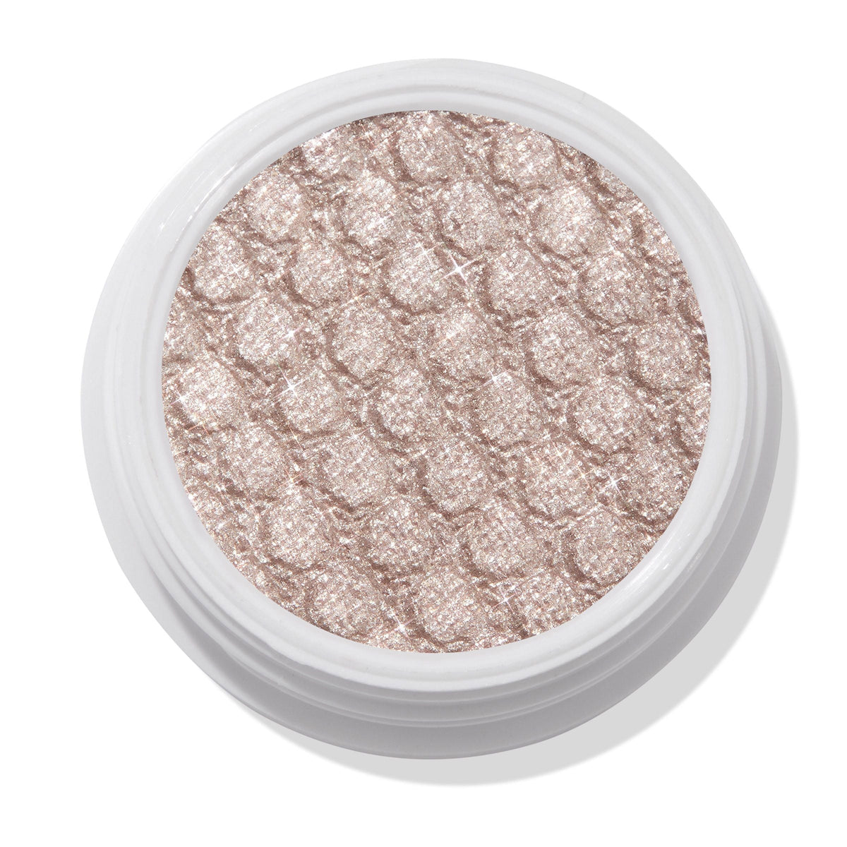 ColourPop I Heart This Super Shock Shadow displaying a sparkly champagne-beige eyeshadow with silver shimmer and a bouncy quilted texture, set in a round white pot and shown top-down on a clean white background.