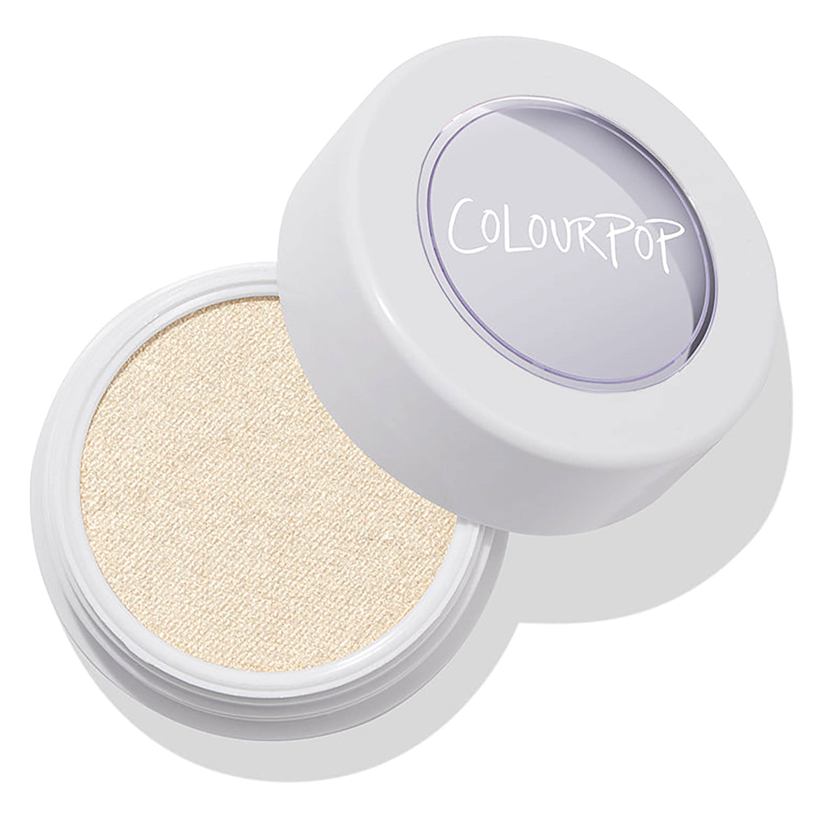 ColourPop Stole the Show Super Shock Highlighter opens to reveal a shimmery champagne pan, the white round pot with a clear ColourPop lid tilted beside it on a clean white background, delivering a luminous cream-to-powder glow.