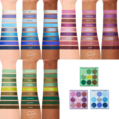 Rainbow Rush ColourPop Shadow Palette Set swatches - cool blue, purple, and green hues - swept across multiple skin tones, with three open 9-pan palettes (Blue Moon, It’s My Pleasure, Just My Luck) shown, highlighting matte and metallic finishes.