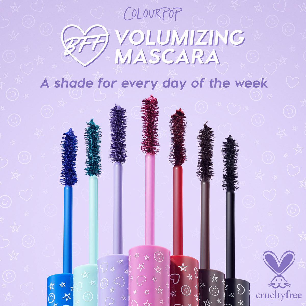 ColourPop BFF Mascara wands in multiple bold shades lined up on a lavender background with hearts and stars, highlighting the Brownie Points brown mascara as a cruelty-free volumizing Colourpop mascara option for everyday wear.