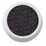 ColourPop Bae Super Shock Shadow shimmering in a white round pot, a deep plum-black cream eyeshadow packed with teal and blue microglitter and a quilted texture, shown close-up on a clean white background.