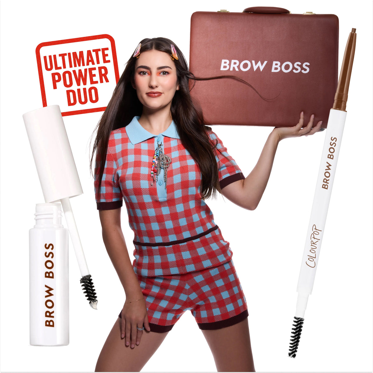 Model posing in retro red and blue checkered outfit, holding a briefcase labeled Brow Boss, surrounded by ColourPop Brow Boss Pencil in Taupe and brow gel, promoting brow makeup as the ultimate power duo on a clean white background.