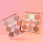 Two open nine-pan palettes from the Baby Got Blush ColourPop Shadow Palette Set, Blush Baby and Baby Got Peach, showing matte and shimmer pink, peach, and neutral shades in clear-lid compacts on a pink gradient backdrop.