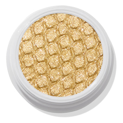 ColourPop Cheap Date Super Shock Shadow, a metallic warm gold shimmer eyeshadow with a honeycomb-embossed texture, sparkling in a round white pot viewed top-down on a white background.