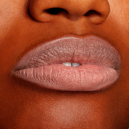 Lips wear Cool BFF, a cool-toned pink-beige ColourPop Lippie Pencil, lining and filling the lips for a smooth matte finish in a tight studio close-up.
