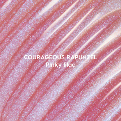 Courageous Rapunzel Ultra Glossy Lip swatch showing shimmery pinky lilac Disney Princess lip gloss with high-shine, iridescent glitter streaks spread in smooth, reflective waves on a close-up background.