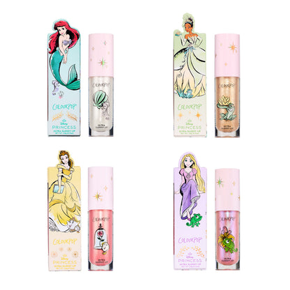 ColourPop Princess Pout full collection set showing four Disney Princess Ultra Glossy Lip tubes with matching cartons featuring Ariel, Tiana, Belle, and Rapunzel artwork on pastel packaging against a white background.
