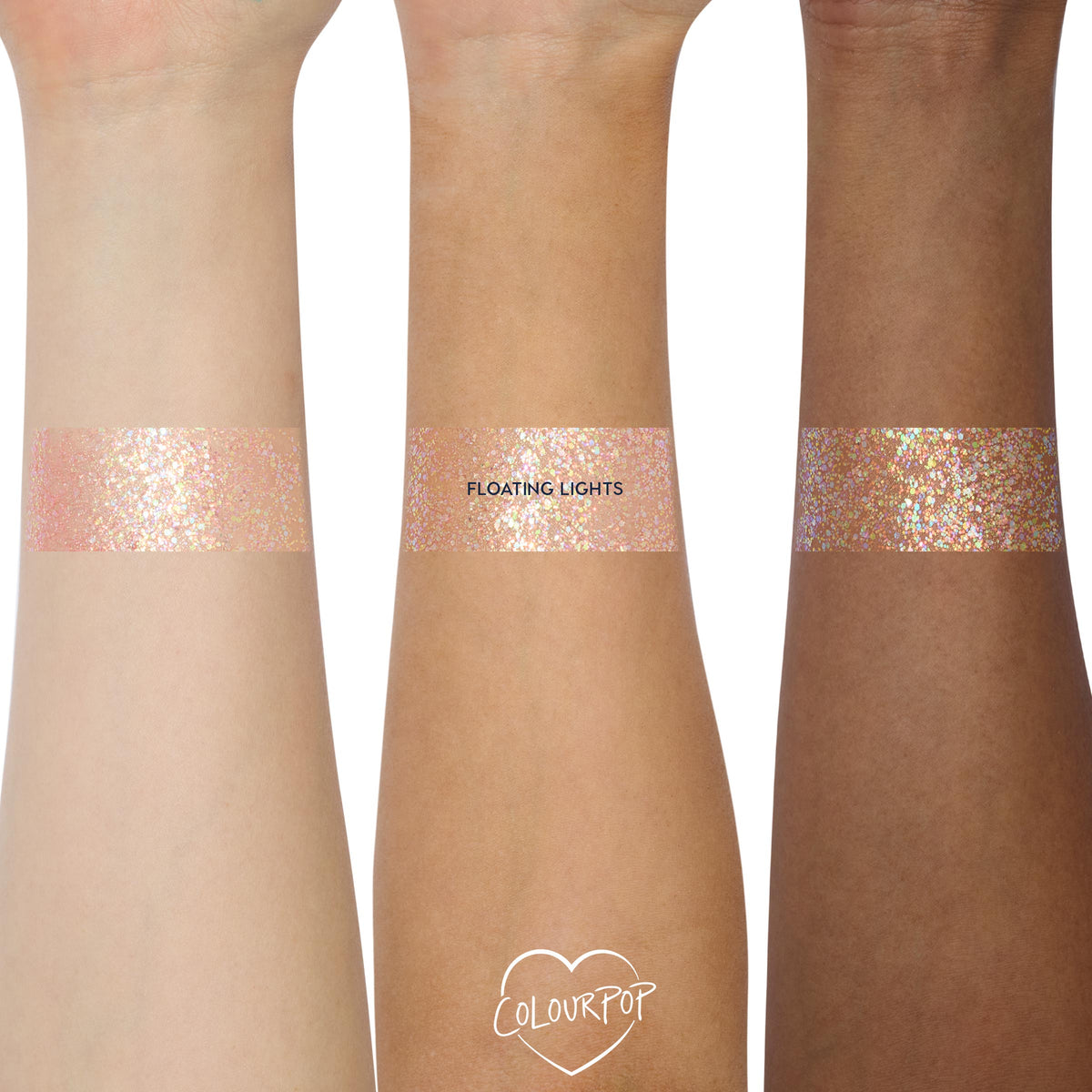 Floating Lights ColourPop Glitter Gel swatched in wide bands on three forearms, showing iridescent pink-lavender and gold multi-size glitter in a sheer gel base, demonstrating payoff across light, medium, and deep skin tones.