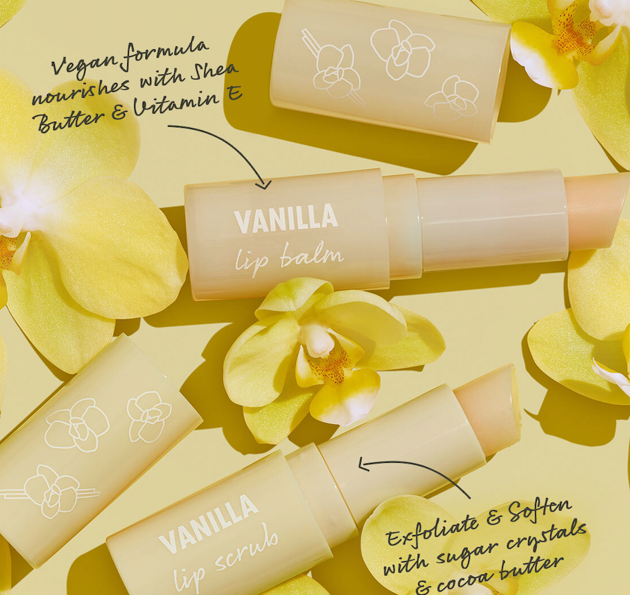 ColourPop Vanilla Kisses Lip Care Set shows an open vanilla lip balm and lip scrub in pale yellow tubes with orchid icons, featuring vegan shea butter, vitamin E, sugar crystals, and cocoa butter among yellow orchids on a pastel backdrop.