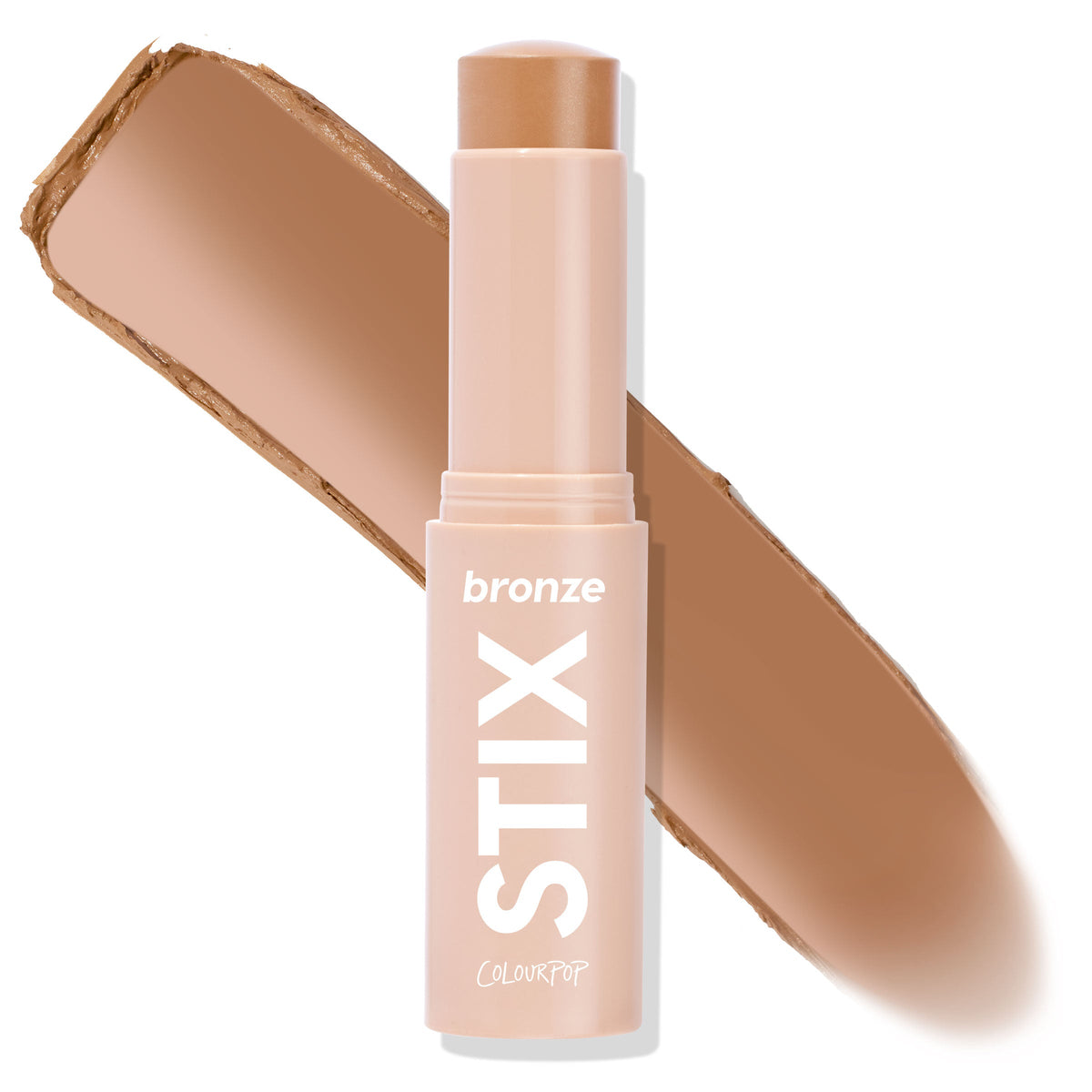 ColourPop Bronzer Stix La Jolla Cove twists up to reveal a warm medium bronze balm, shown uncapped with a wide swipe of the creamy shade behind it; nude tube with bold white STIX branding on a white background for a sun-kissed contour.