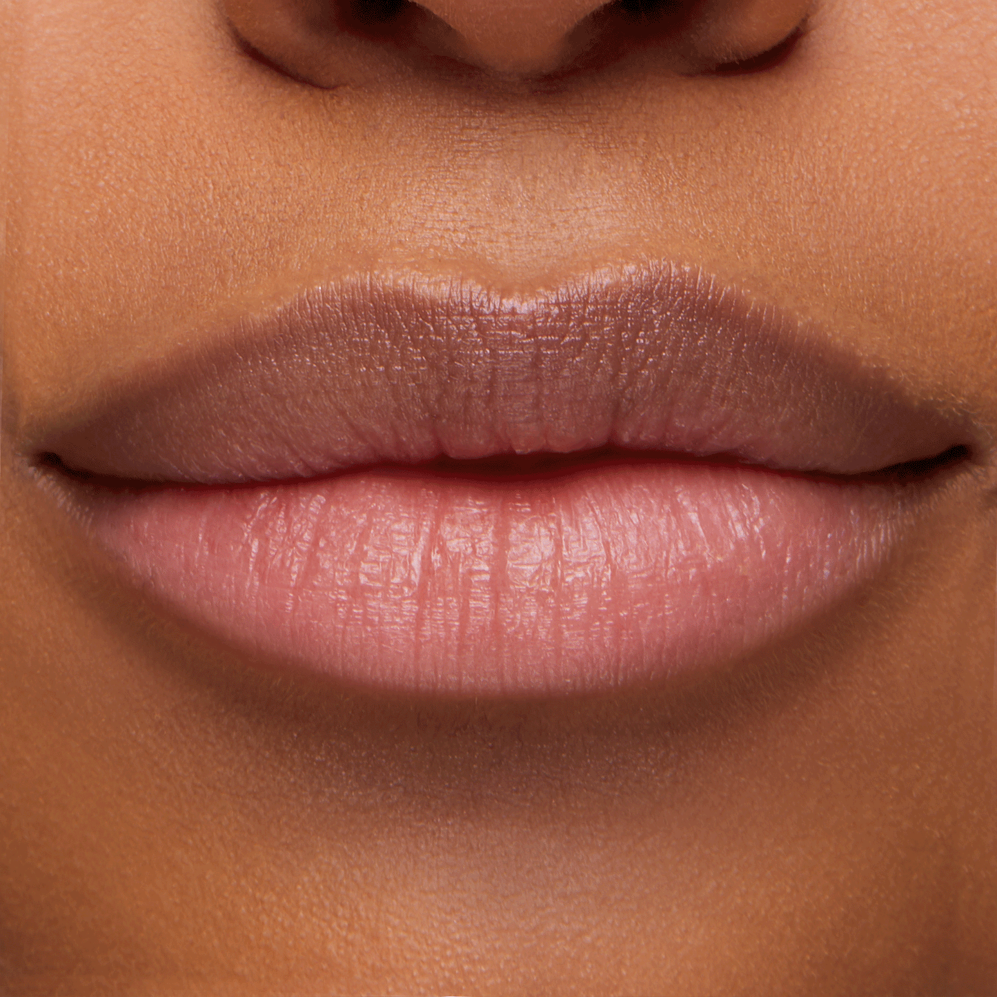 Lips wearing You're a Catch ColourPop Lip Mask, delivering a smooth, hydrated, soft-pink sheen in a tight close-up, highlighting the glossy finish and texture of the lip mask.