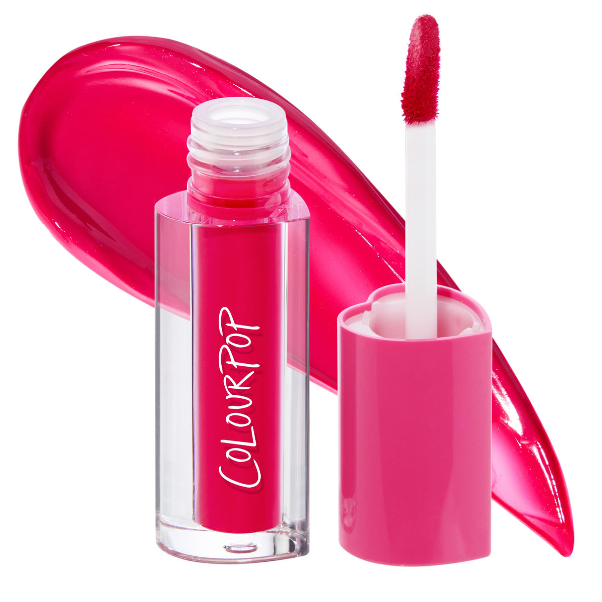 ColourPop Lip Stain in A Little Dramatic shown open with a doe-foot applicator and pink cap beside a clear rectangular tube; a bold hot-pink fuchsia swatch curves behind on white, spotlighting the vivid shade and glossy finish.