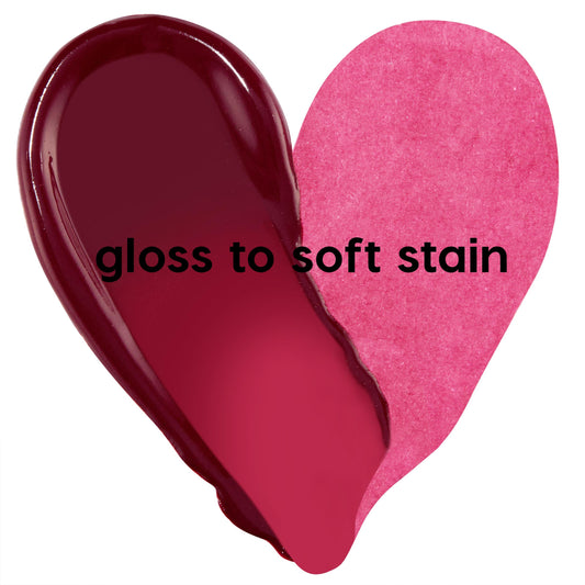 Blueberry Marg ColourPop Lip Stain swatch forms a heart, showing two finishes - gloss it with deep berry shine on the left and stain it with sheer rosy tint on the right - set against a white background.