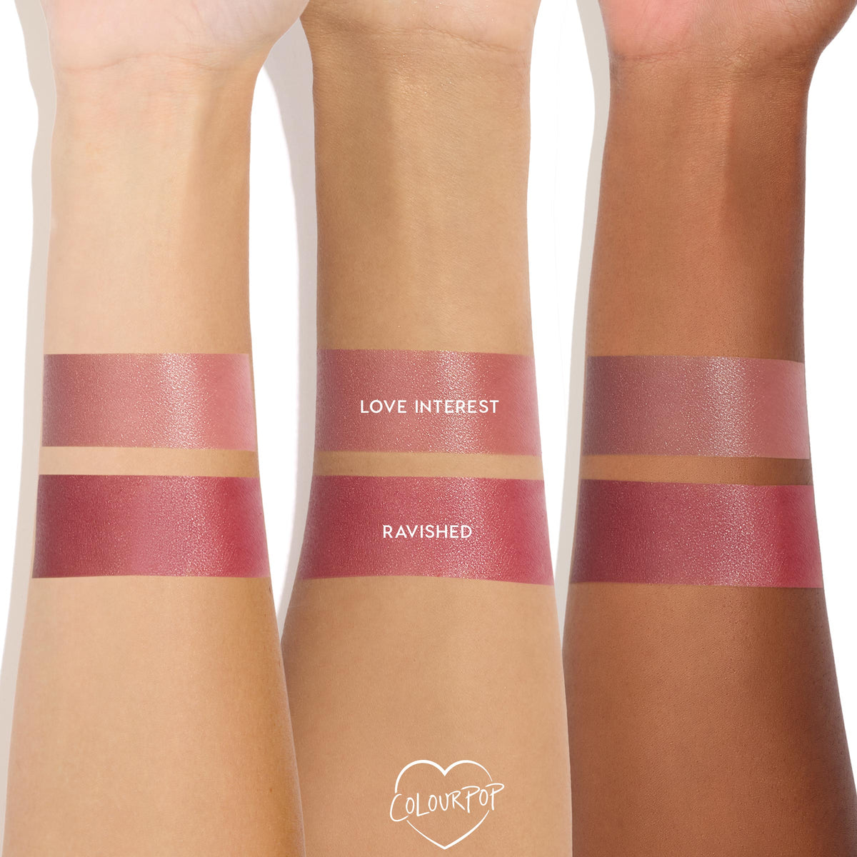 Love Interest ColourPop Lip and Cheek Balm swatched on three skin tones, with two stacked stripes per arm labeled Love Interest and Ravished, showing a dewy rosy-mauve finish and buildable multi-use coverage on a white studio background.