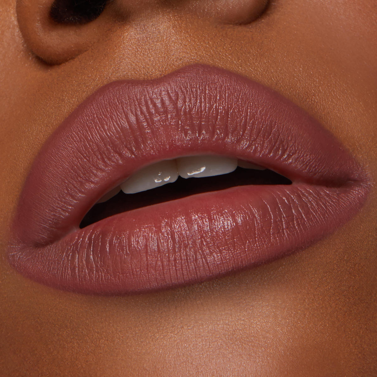 Full lips lined and filled with ColourPop Lippie Pencil in Double Tap, showing a soft-matte rose mauve finish with precise edges; close-up beauty swatch highlighting creamy pigment and smooth texture.