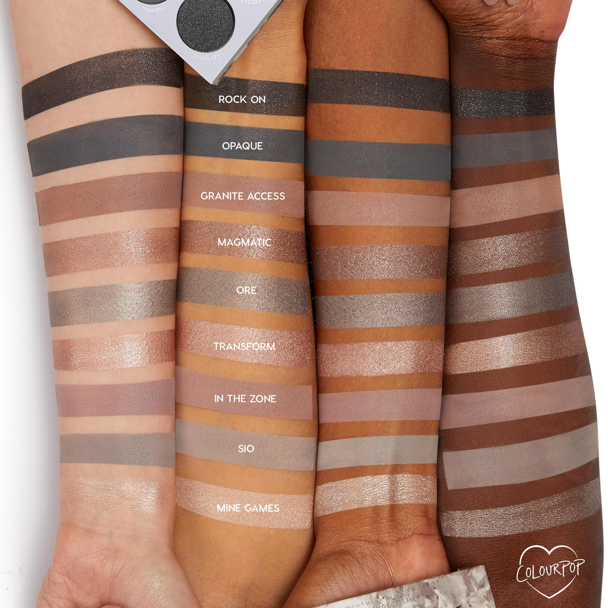 ColourPop Of Quartz Shadow Palette swatches span three arms, showing cool‑toned taupe, gray, and metallic neutrals - Rock On, Opaque, Granite Access, Magmatic, Ore, Transform, In the Zone, Sio, Mine Games - with the palette corner visible.