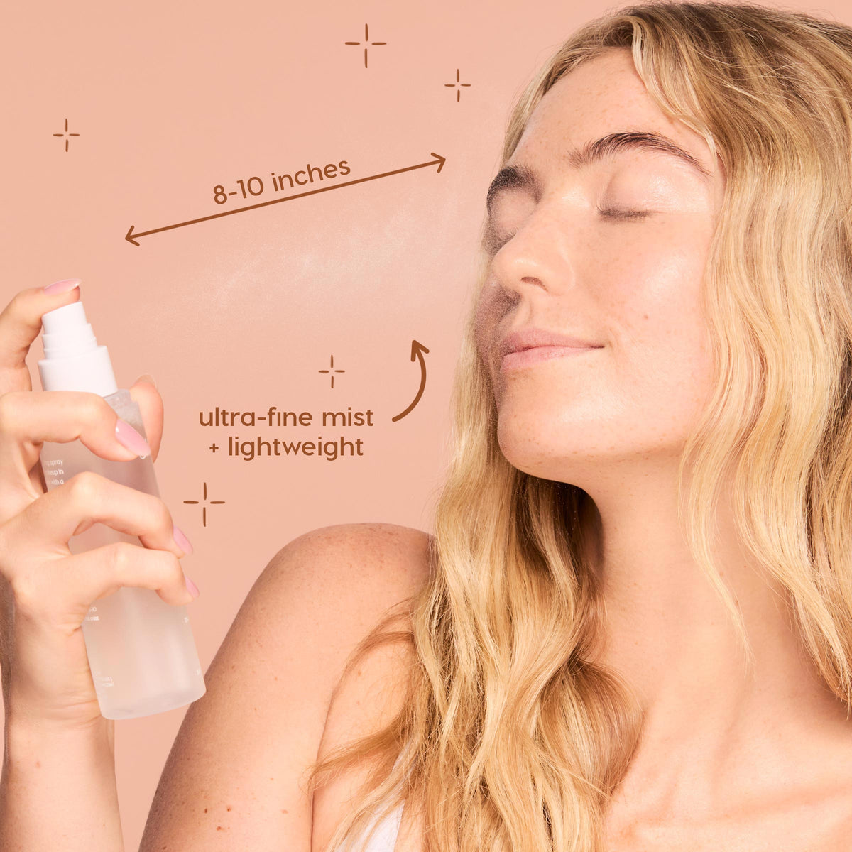 Lock It In, ColourPop Pretty Fresh Setting Spray, spritzing an ultra-fine lightweight mist 8–10 inches from the face as a model with eyes closed holds a frosted bottle against a peach backdrop, demonstrating makeup-setting use.
