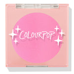 Prairie Air ColourPop Pressed Powder Blush compact sits closed, displaying a vibrant bubblegum pink pan beneath a clear lid with white sparkle icons and the ColourPop logo, housed in a peach square case on a white background.