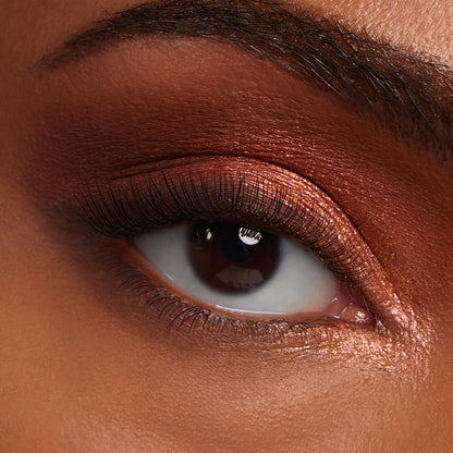 Rose-gold metallic eyeshadow blended across the lid with copper shimmer and an inner-corner highlight, lashes softly defined - showcasing Metallic Mood ColourPop Shadow Palette & Brush Set in a macro close-up beauty shot.