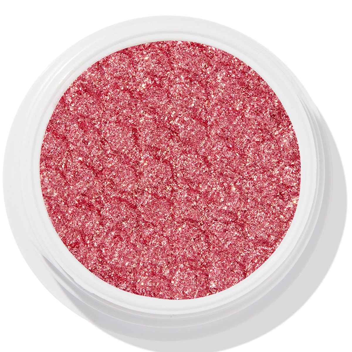 ColourPop Roy G. Biv Super Shock Shadow shimmers in rose‑pink with gold microglitter, pressed in a bouncy, textured pan set in a round white pot, shown in a top‑down studio close‑up.