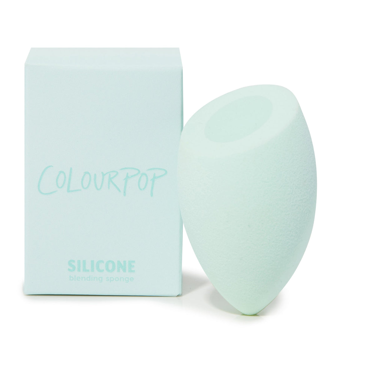 Silicone Blending Sponge standing upright beside a mint ColourPop box, teardrop design with flat top for precise foundation and concealer blending; a ColourPop Makeup Tools & Accessories essential for smooth, streak-free application.