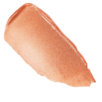 Shimmery peach-nude swatch glides in a thick, high-shine streak on white background, showcasing Angel Baby, the ColourPop So Juicy Plumping Gloss Balm with Peptides, a glossy, peptide-infused formula with micro-sparkle and cushiony sheen.