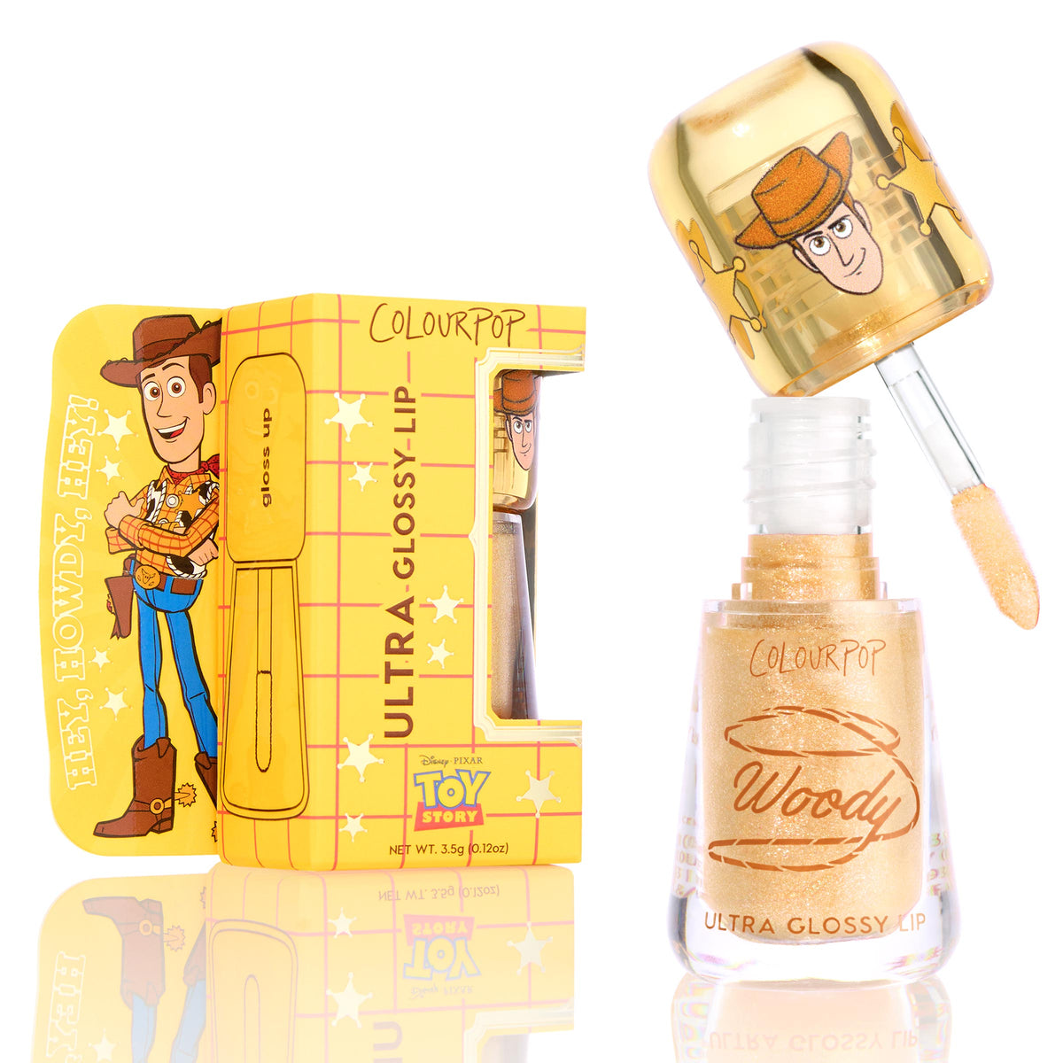 ColourPop Ultra Glossy Lip Favorite Deputy, a warm gold glitter gloss, shown with doe-foot applicator lifted from clear tube; Woody artwork on gold cap and matching yellow Toy Story box, 3.5g/0.12oz.