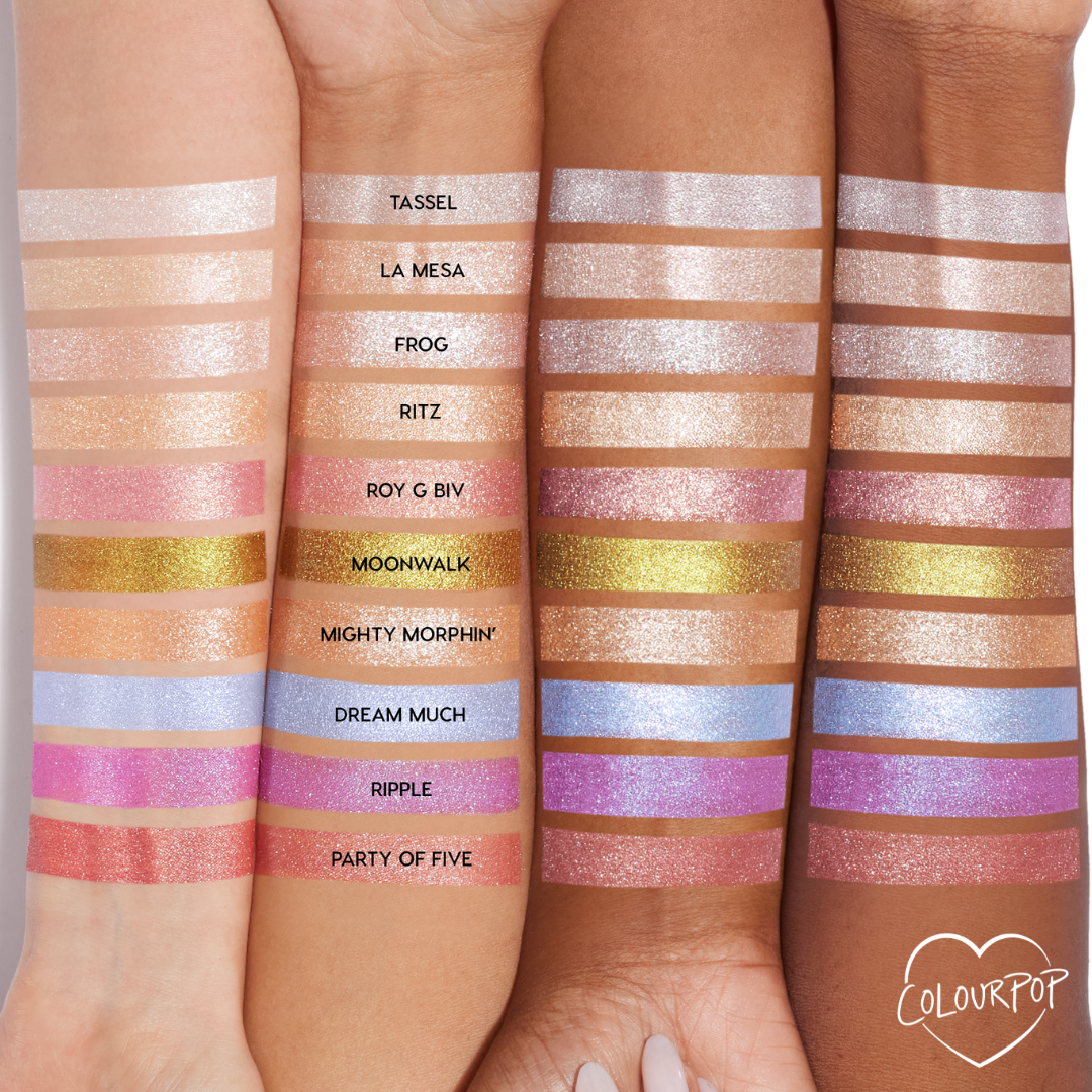 Roy G. Biv Super Shock Shadow by ColourPop swatched - sparkling rosy pink with fine shimmer - striped on three forearms of different skin tones, displayed among labeled shades under studio lighting to show color payoff and shift.